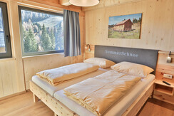 Almresort Sommerschnee Schlafzimmer