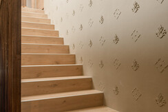 Staircase with vintage wallpaper