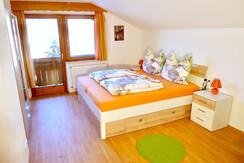 Schlafzimmer mit Balkon