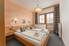 Schlafzimmer mit eigenem Balkon