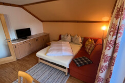 Orange Schlafsofa